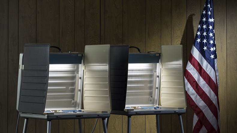 Voting booth with American flag