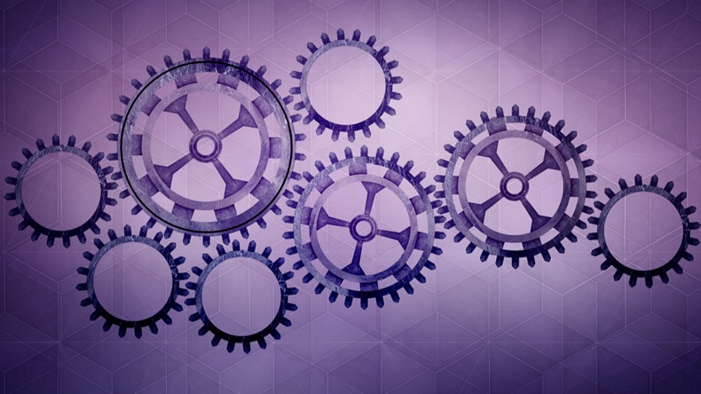 Cogs on purple background