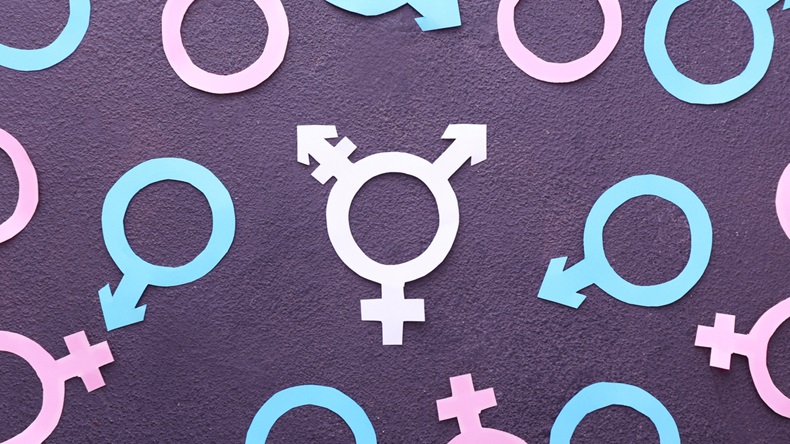 Symbols of man, woman and transgender on dark background